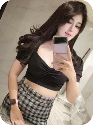 Della Indonesia escort enjoying a playful moment in Kuala Lumpur