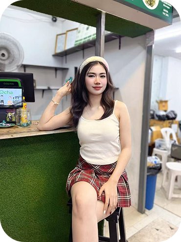 Ing Thailand escort smiling during a relaxed moment in Kuala Lumpur
